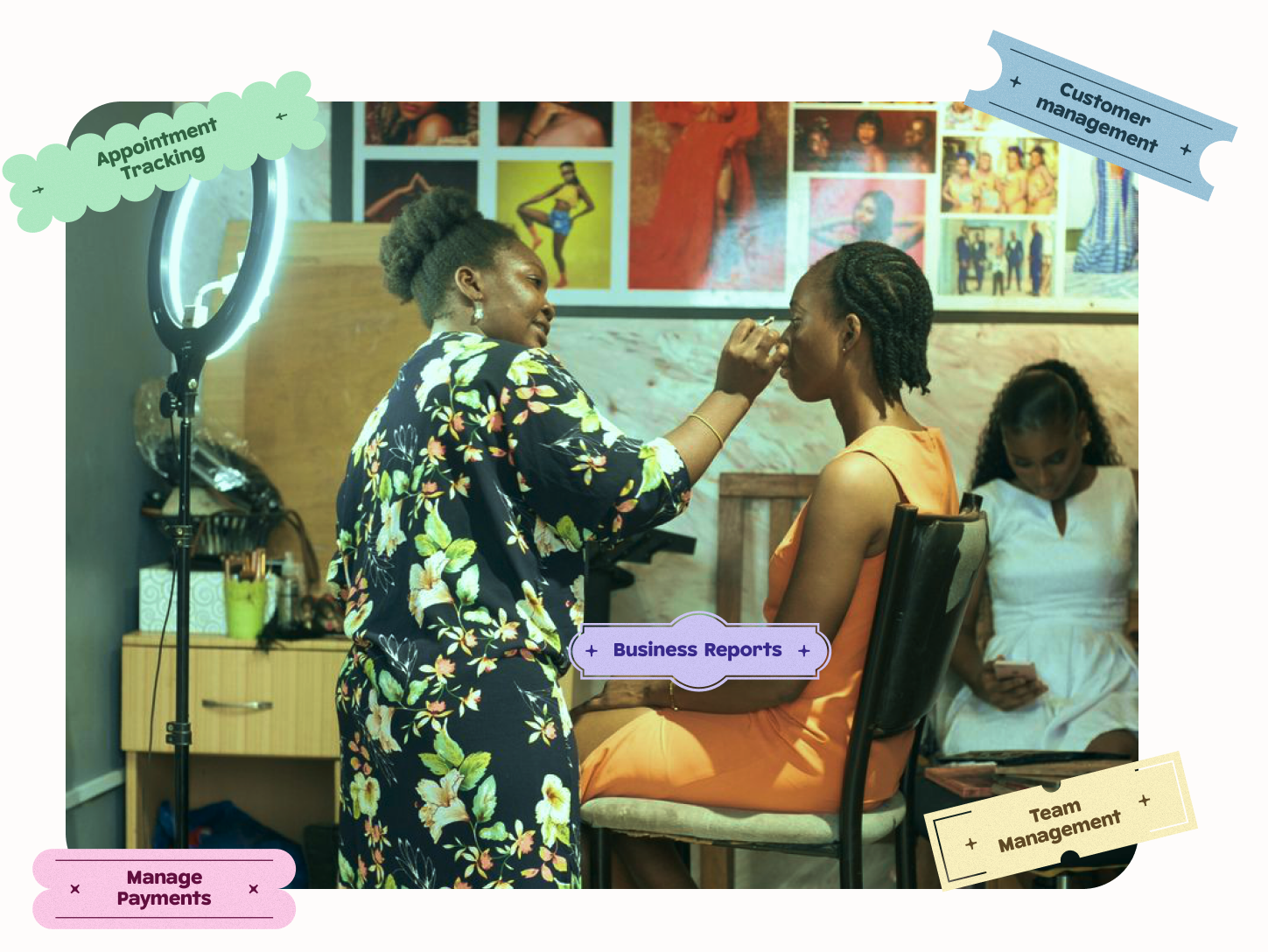 A makeup artist working with a client in a Nigerian beauty studio, with feature labels for appointment tracking, customer management, business reports, team management and payments